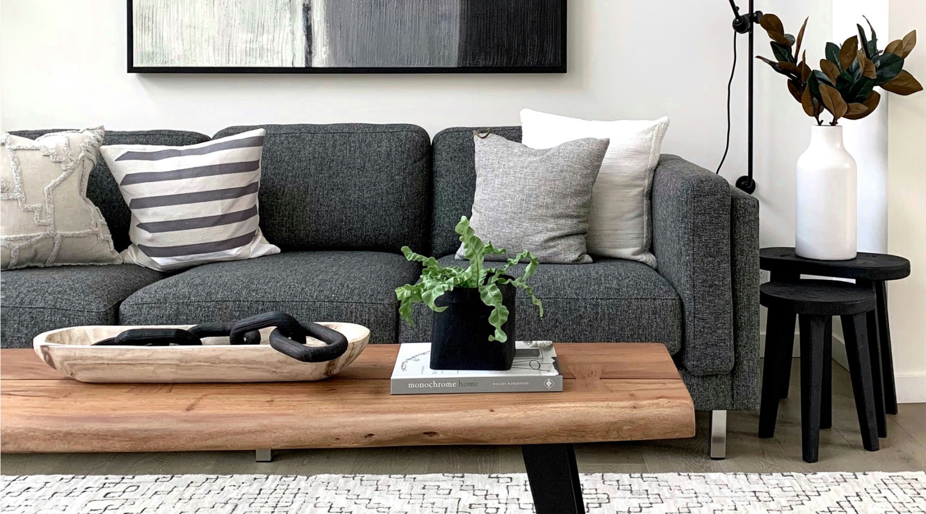 a living room with a couch and a coffee table